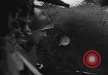 Image of US Soldiers examine damaged US M4 and German Panther tank Sterpigny Belgium, 1945, second 20 stock footage video 65675071156