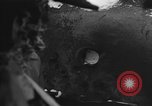 Image of US Soldiers examine damaged US M4 and German Panther tank Sterpigny Belgium, 1945, second 21 stock footage video 65675071156