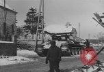 Image of US Soldiers examine damaged US M4 and German Panther tank Sterpigny Belgium, 1945, second 36 stock footage video 65675071156