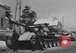 Image of US Soldiers examine damaged US M4 and German Panther tank Sterpigny Belgium, 1945, second 39 stock footage video 65675071156