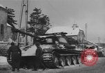Image of US Soldiers examine damaged US M4 and German Panther tank Sterpigny Belgium, 1945, second 40 stock footage video 65675071156