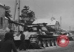 Image of US Soldiers examine damaged US M4 and German Panther tank Sterpigny Belgium, 1945, second 41 stock footage video 65675071156