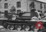 Image of US Soldiers examine damaged US M4 and German Panther tank Sterpigny Belgium, 1945, second 43 stock footage video 65675071156