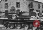 Image of US Soldiers examine damaged US M4 and German Panther tank Sterpigny Belgium, 1945, second 47 stock footage video 65675071156
