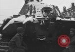 Image of US Soldiers examine damaged US M4 and German Panther tank Sterpigny Belgium, 1945, second 50 stock footage video 65675071156