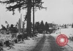 Image of US Soldiers examine damaged US M4 and German Panther tank Sterpigny Belgium, 1945, second 61 stock footage video 65675071156