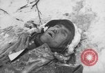 Image of Bodies of dead German soldiers in snow Ambleve Belgium, 1945, second 58 stock footage video 65675071159