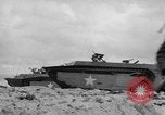 Image of amphibious landing Palau Islands, 1944, second 5 stock footage video 65675071181