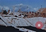 Image of Religious services at a bomb crater on Midway Island Pacific Ocean, 1942, second 8 stock footage video 65675071189