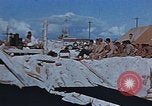Image of Religious services at a bomb crater on Midway Island Pacific Ocean, 1942, second 9 stock footage video 65675071189