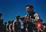 Image of Religious services at a bomb crater on Midway Island Pacific Ocean, 1942, second 28 stock footage video 65675071189