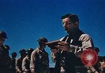 Image of Religious services at a bomb crater on Midway Island Pacific Ocean, 1942, second 30 stock footage video 65675071189