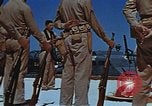 Image of Religious services at a bomb crater on Midway Island Pacific Ocean, 1942, second 32 stock footage video 65675071189