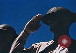 Image of Religious services at a bomb crater on Midway Island Pacific Ocean, 1942, second 45 stock footage video 65675071189