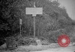 Image of Renault FT tank runs down a street sign Western Front, 1918, second 3 stock footage video 65675071196