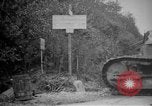 Image of Renault FT tank runs down a street sign Western Front, 1918, second 5 stock footage video 65675071196