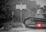 Image of Renault FT tank runs down a street sign Western Front, 1918, second 6 stock footage video 65675071196