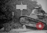 Image of Renault FT tank runs down a street sign Western Front, 1918, second 7 stock footage video 65675071196