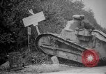 Image of Renault FT tank runs down a street sign Western Front, 1918, second 8 stock footage video 65675071196