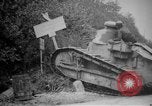 Image of Renault FT tank runs down a street sign Western Front, 1918, second 9 stock footage video 65675071196