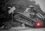 Image of Renault FT tank runs down a street sign Western Front, 1918, second 10 stock footage video 65675071196