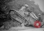 Image of Renault FT tank runs down a street sign Western Front, 1918, second 12 stock footage video 65675071196