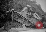 Image of Renault FT tank runs down a street sign Western Front, 1918, second 13 stock footage video 65675071196