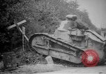 Image of Renault FT tank runs down a street sign Western Front, 1918, second 15 stock footage video 65675071196