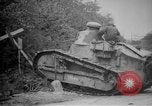 Image of Renault FT tank runs down a street sign Western Front, 1918, second 16 stock footage video 65675071196