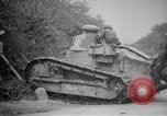 Image of Renault FT tank runs down a street sign Western Front, 1918, second 17 stock footage video 65675071196