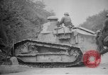 Image of Renault FT tank runs down a street sign Western Front, 1918, second 18 stock footage video 65675071196