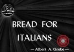 Image of bread supplied to Italian citizens in World War 2 Italy, 1944, second 1 stock footage video 65675071256