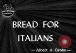 Image of bread supplied to Italian citizens in World War 2 Italy, 1944, second 4 stock footage video 65675071256