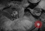 Image of bread supplied to Italian citizens in World War 2 Italy, 1944, second 15 stock footage video 65675071256