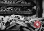 Image of bread supplied to Italian citizens in World War 2 Italy, 1944, second 25 stock footage video 65675071256