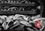 Image of bread supplied to Italian citizens in World War 2 Italy, 1944, second 26 stock footage video 65675071256
