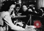 Image of bread supplied to Italian citizens in World War 2 Italy, 1944, second 33 stock footage video 65675071256