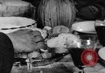 Image of bread supplied to Italian citizens in World War 2 Italy, 1944, second 35 stock footage video 65675071256