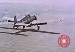 Standbild F6Fs und Douglas SBD Dauntless auf Flight Deck der USS Lexington Pazifik, 1944, aus Sekunde 3 historischem Filmmaterial Videoclip 65675071278