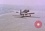 Standbild F6Fs und Douglas SBD Dauntless auf Flight Deck der USS Lexington Pazifik, 1944, aus Sekunde 4 historischem Filmmaterial Videoclip 65675071278