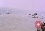 Standbild F6Fs und Douglas SBD Dauntless auf Flight Deck der USS Lexington Pazifik, 1944, aus Sekunde 6 historischem Filmmaterial Videoclip 65675071278
