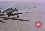Standbild F6Fs und Douglas SBD Dauntless auf Flight Deck der USS Lexington Pazifik, 1944, aus Sekunde 12 historischem Filmmaterial Videoclip 65675071278