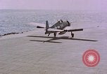 Standbild F6Fs und Douglas SBD Dauntless auf Flight Deck der USS Lexington Pazifik, 1944, aus Sekunde 13 historischem Filmmaterial Videoclip 65675071278