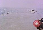 Standbild F6Fs und Douglas SBD Dauntless auf Flight Deck der USS Lexington Pazifik, 1944, aus Sekunde 16 historischem Filmmaterial Videoclip 65675071278