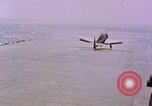 Standbild F6Fs und Douglas SBD Dauntless auf Flight Deck der USS Lexington Pazifik, 1944, aus Sekunde 25 historischem Filmmaterial Videoclip 65675071278