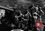 Image of invasion fleet Iwo Jima, 1945, second 15 stock footage video 65675071357