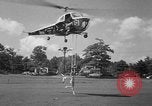 Image of Marilyn Rich stunt on rings New York City USA, 1951, second 18 stock footage video 65675071433