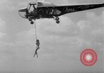 Image of Marilyn Rich stunt on rings New York City USA, 1951, second 24 stock footage video 65675071433