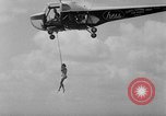 Image of Marilyn Rich stunt on rings New York City USA, 1951, second 25 stock footage video 65675071433
