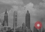 Image of Marilyn Rich stunt on rings New York City USA, 1951, second 26 stock footage video 65675071433